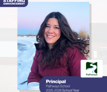 woman smiling for the camera in an outdoor winter setting
